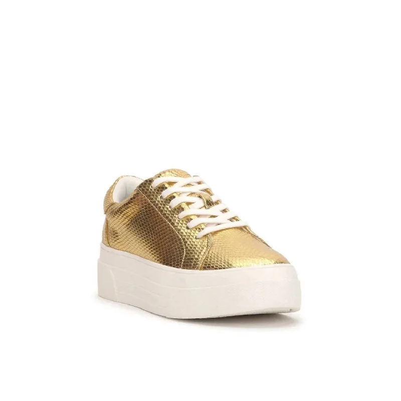 athletic shoes for maximum comfort-  Shoes for running with breathable and cushioned material-Comfortable sandals for all-day wear at theme parks-Caitrona Platform Sneaker In Gold